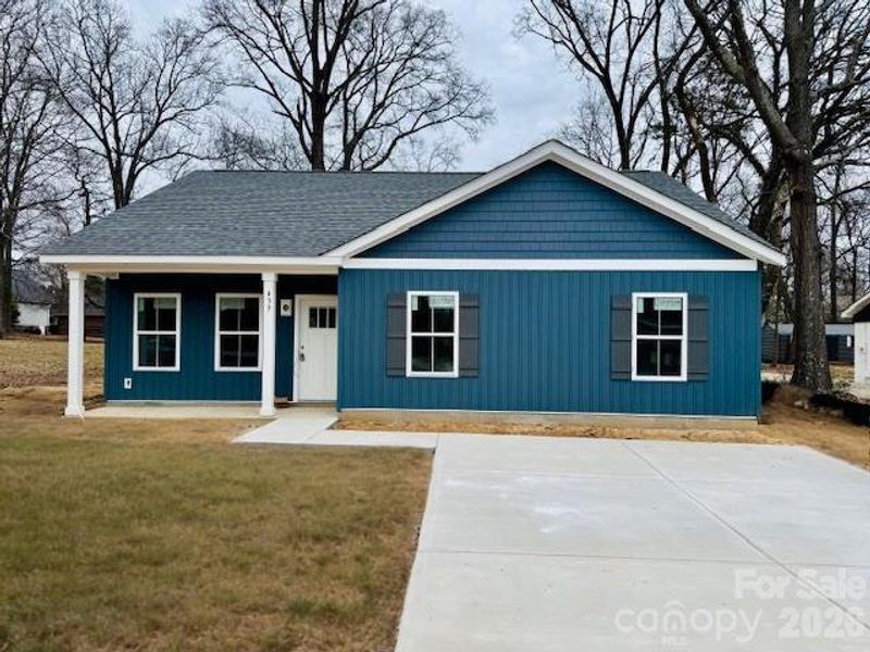 Front exterior of a new home in , Concord, NC, highlighting curb appeal (Image 2). Front exterior of a new home in , Concord, NC, highlighting curb appeal (Image 2).