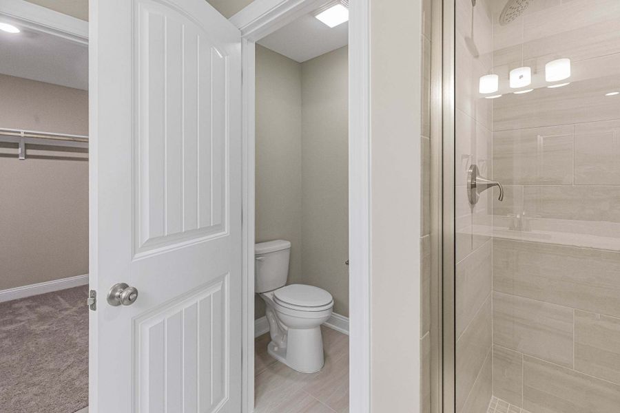 Representative furnished interior of a home built from the Magnolia by Caviness & Cates Communities in Bartlett Manor, Youngsville (Image 222).