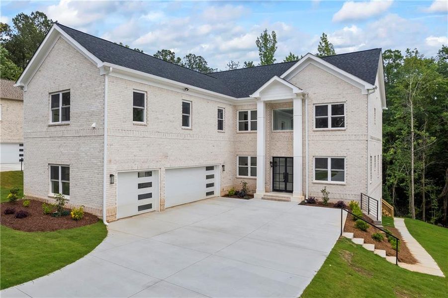Front exterior of a new home in , Fairburn, GA, highlighting curb appeal (Image 26).