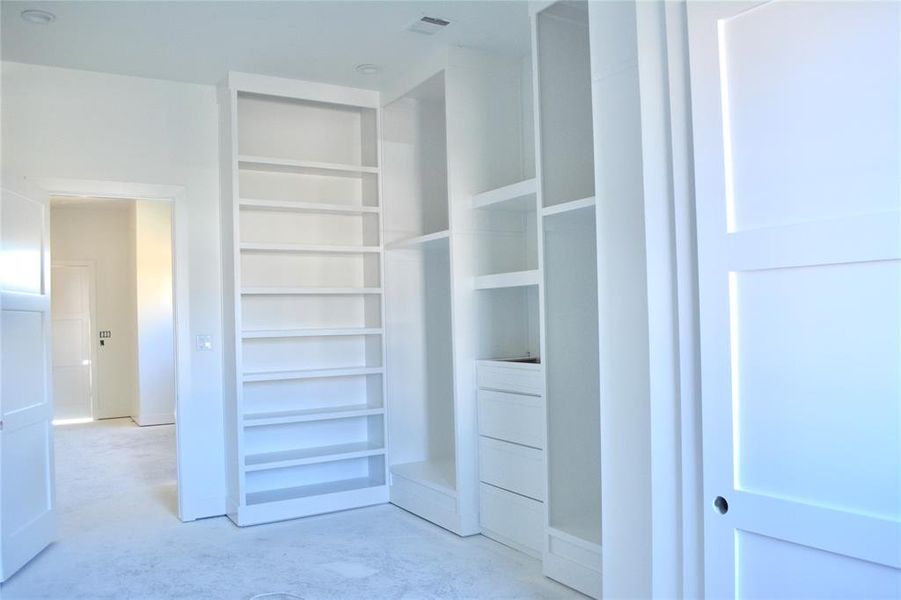 View of one of the primary closet