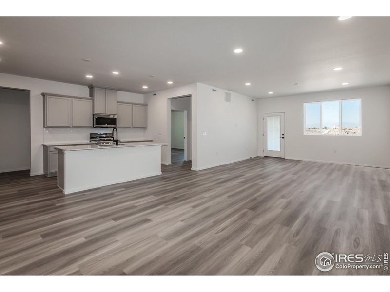 KITCHEN, DINING AND LIVING ROOM