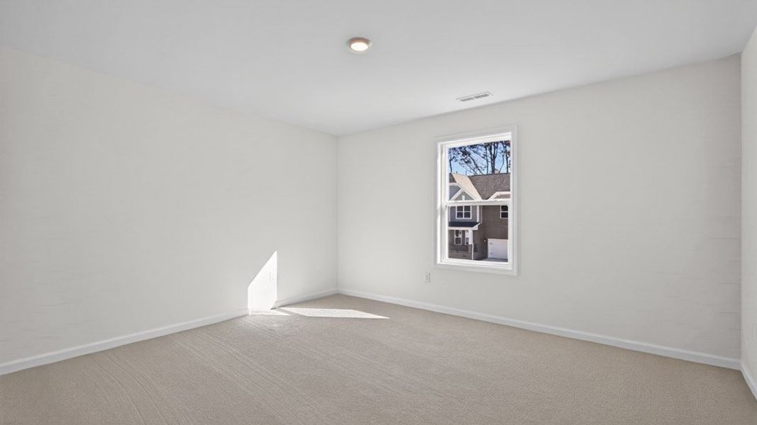 Spacious, unfurnished interior of a new home in The Estates Park, Apex (Image 30).