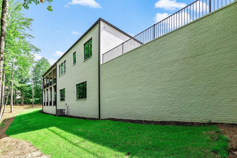 Exterior details and patio area of a home in , Newnan (Image 52).