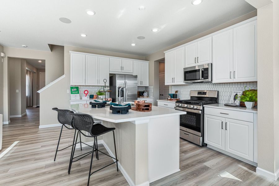 Furnished interior view inside a new home in Trailstone, Arvada (Image 11).