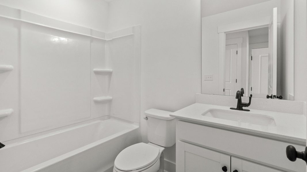 Furnished interior view inside a new home in Seabreeze Crossing, Little River (Image 16).