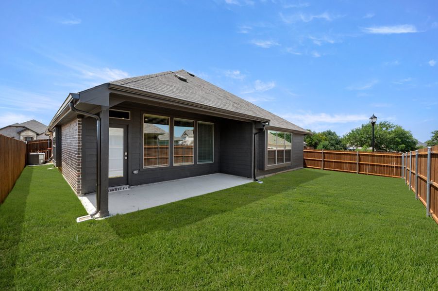 Exterior details and patio area of a home in Pirate Village, Granbury (Image 4).