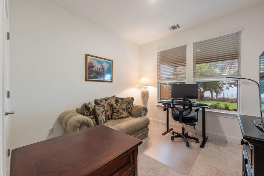 A well-lit home office provides a dedicated space for productivity and focus. A well-lit home office provides a dedicated space for productivity and focus.