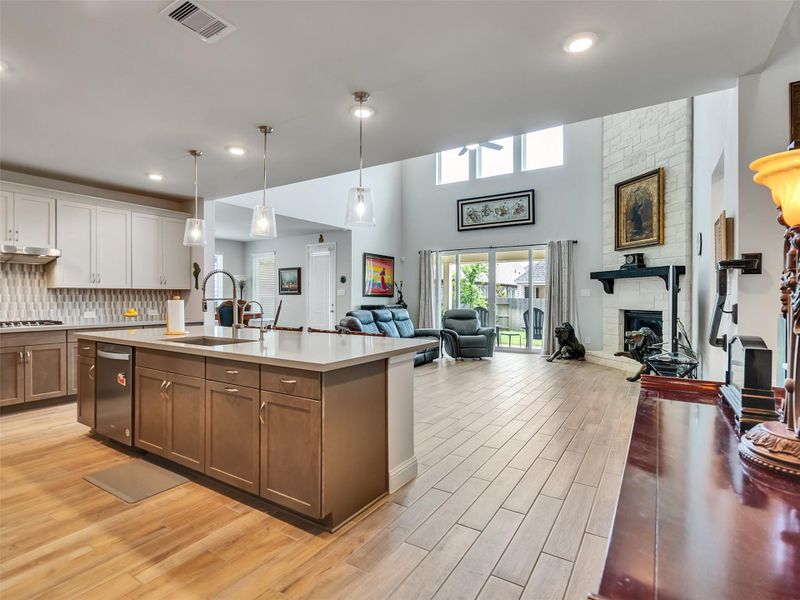 two large sliding glass doors provide easy access to the outdoors