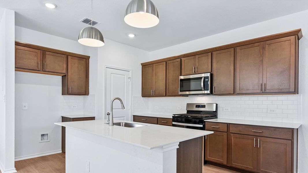 Furnished interior view inside a new home in Valverde, Bastrop (Image 9).