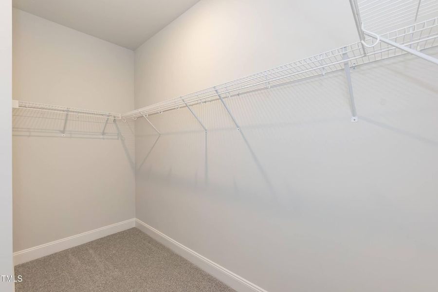 Representative unfurnished interior of a home built from the 2709 by Adams Homes in The Grove at Ballard, Jacksonville (Image 25).