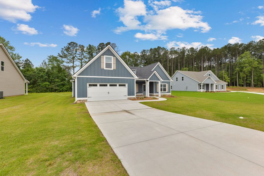 Front exterior of a new home in Standing Oaks, Senoia, GA, highlighting curb appeal (Image 16).