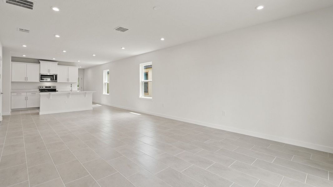 Furnished interior view inside a new home in Grasslands West, Lakeland (Image 13).