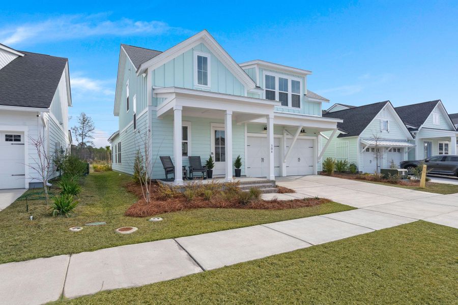 Front exterior of a new home in , Summerville, SC, highlighting curb appeal (Image 25).