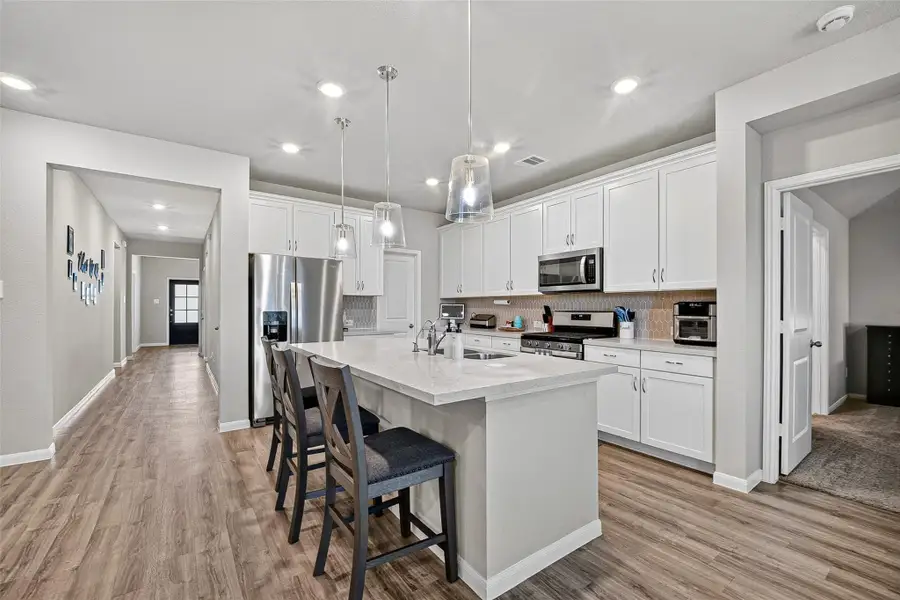 Furnished interior view inside a new home in Sweetgrass Village, Crosby (Image 4).