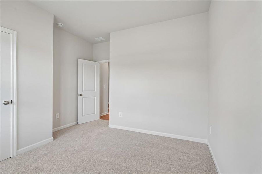 Spacious, unfurnished interior of a new home in Northwoods at Mirror Lake, Villa Rica (Image 24).