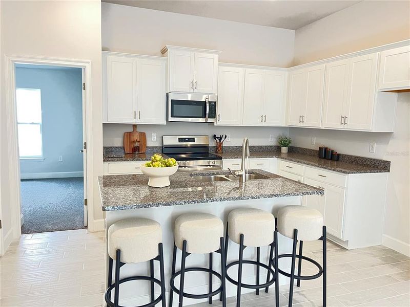 Furnished interior view inside a new home in Abbey Glen, Dade City (Image 8).