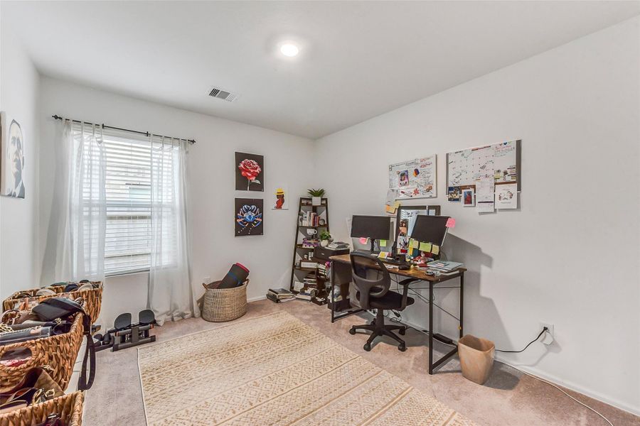 Furnished interior view inside a new home in Burnet Fields at Baytown Crossings, Baytown (Image 15).