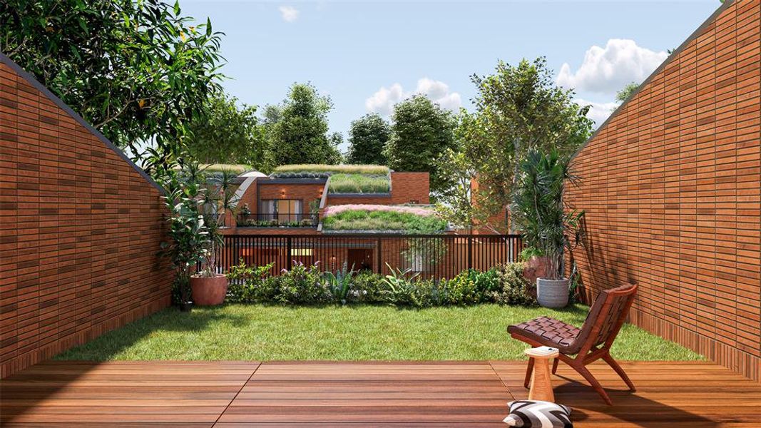 View of yard with a wooden deck