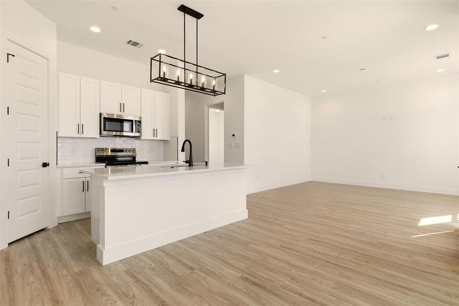 Furnished interior view inside a new home in , Rowlett (Image 6).