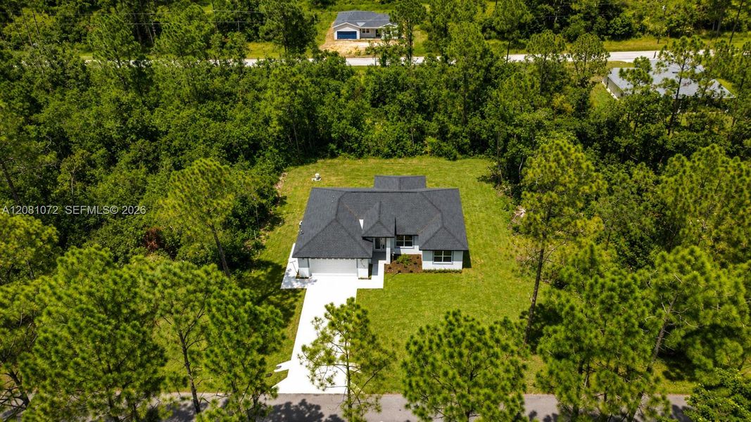 Front exterior of a new home in , Sebring, FL, highlighting curb appeal (Image 27).