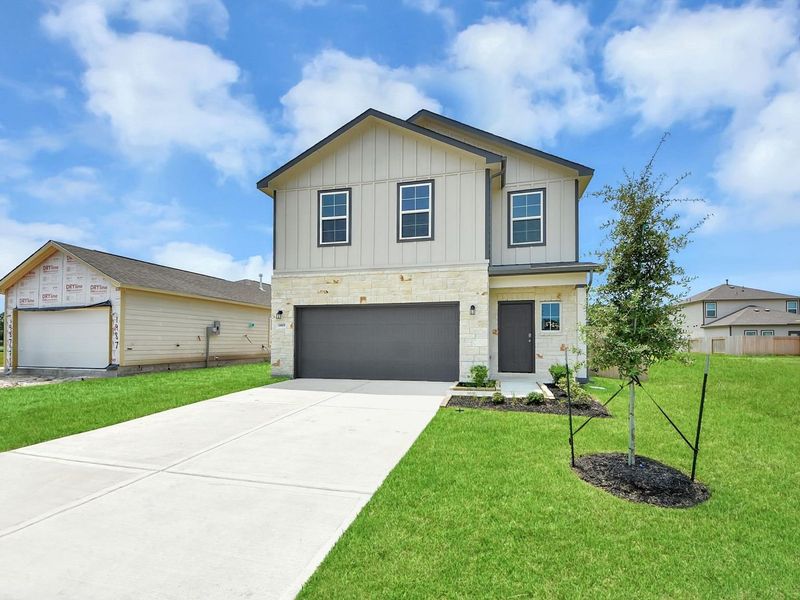 Front exterior of a new home in The Villages at WestPointe, Dayton, TX, highlighting curb appeal (Image 21).