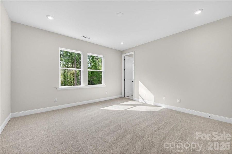 Light filled primary bedroom