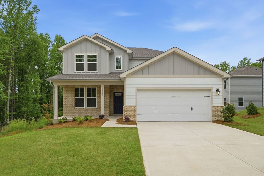Front exterior of a new home in Cannon Manor, Kannapolis, NC, highlighting curb appeal (Image 1). Front exterior of a new home in Cannon Manor, Kannapolis, NC, highlighting curb appeal (Image 1).