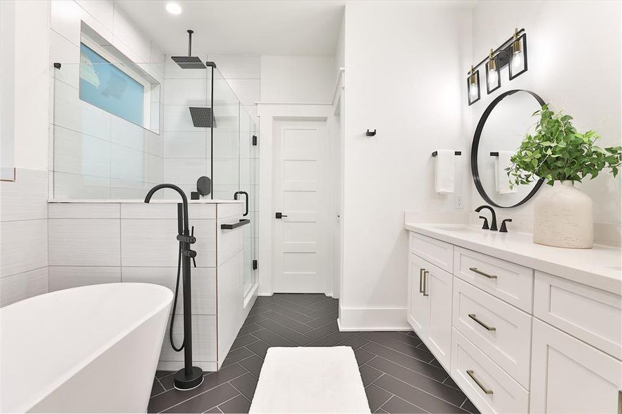 Bask in the abundant natural light of this chic vanity space, perfect for effortless grooming and style checks.