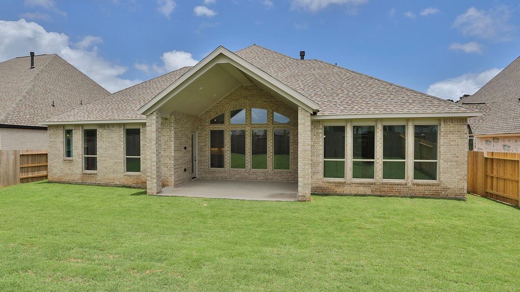 Exterior details and patio area of a home in Evergreen, Conroe (Image 2). Exterior details and patio area of a home in Evergreen, Conroe (Image 2).