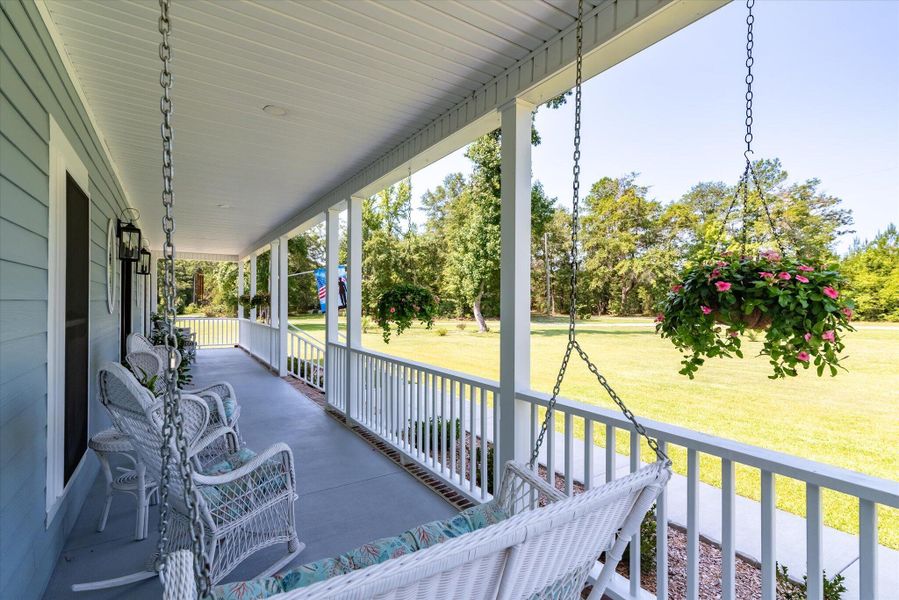 Exterior details and patio area of a home in , Ravenel (Image 25). Exterior details and patio area of a home in , Ravenel (Image 25).