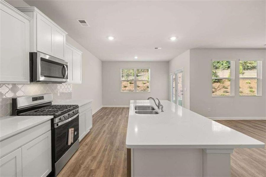 Furnished interior view inside a new home in Poplar Preserve, Newnan (Image 8). Furnished interior view inside a new home in Poplar Preserve, Newnan (Image 8).