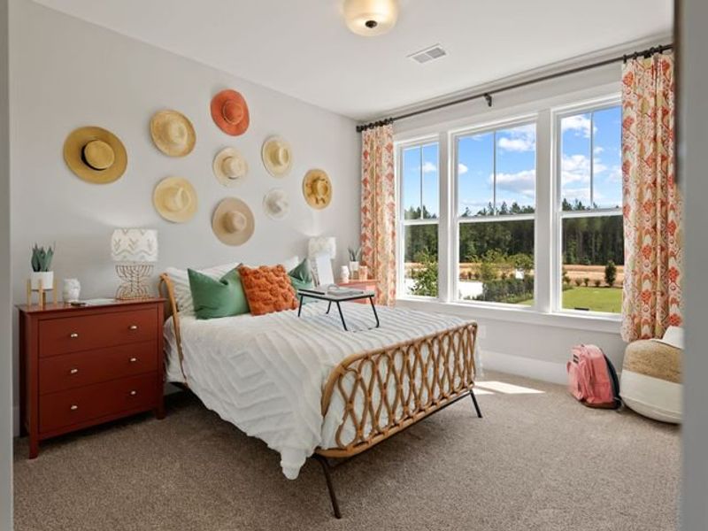 Representative furnished interior of a home built from the Riley P by True Homes in Homecoming, Ravenel (Image 11).