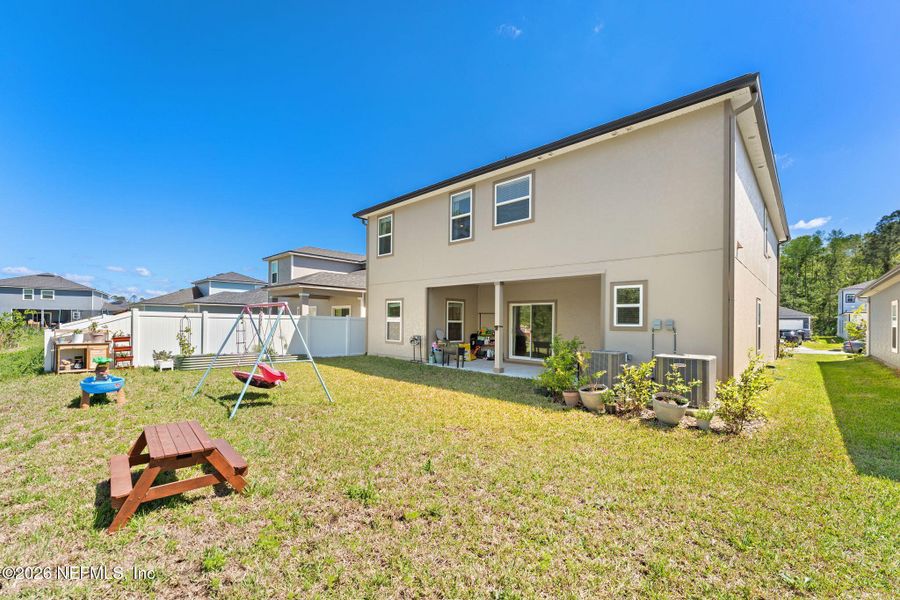 Exterior details and patio area of a home in Wilford Oaks, Orange Park (Image 28).