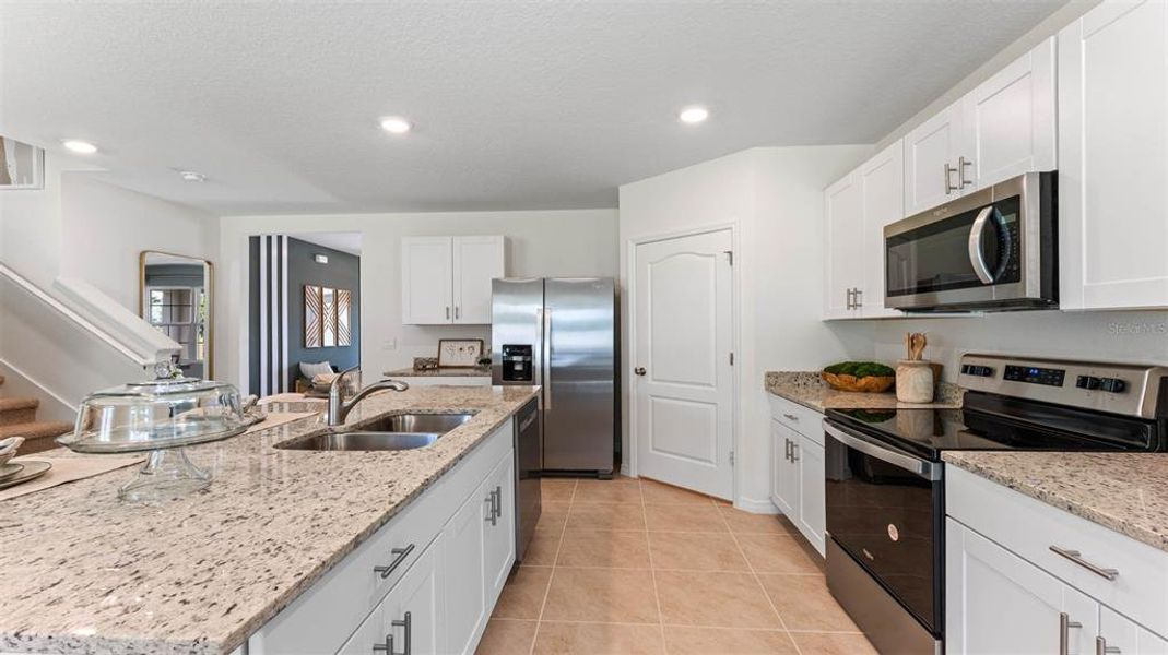 Furnished interior view inside a new home in Oak Leaf Preserve, New Smyrna Beach (Image 17).
