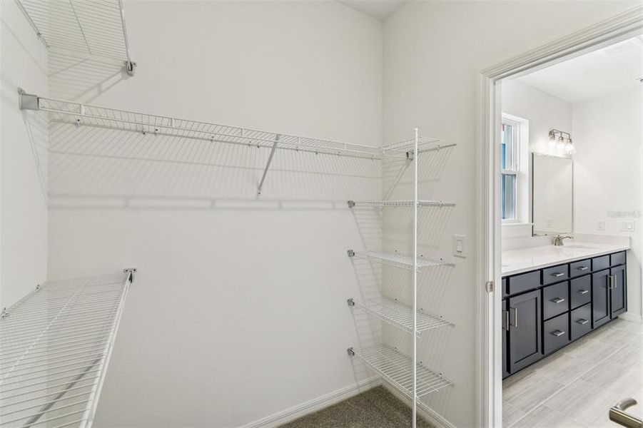 Spacious, unfurnished interior of a new home in Laureate Park at Lake Nona - Garden Series, Orlando (Image 40).