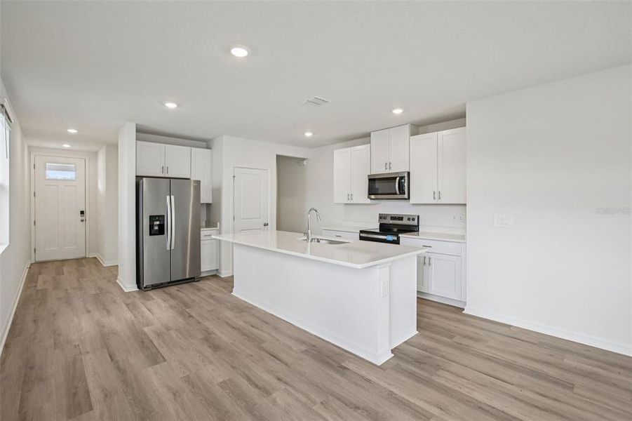 Furnished interior view inside a new home in Two Rivers - Premier Series, Zephyrhills (Image 11). Furnished interior view inside a new home in Two Rivers - Premier Series, Zephyrhills (Image 11).