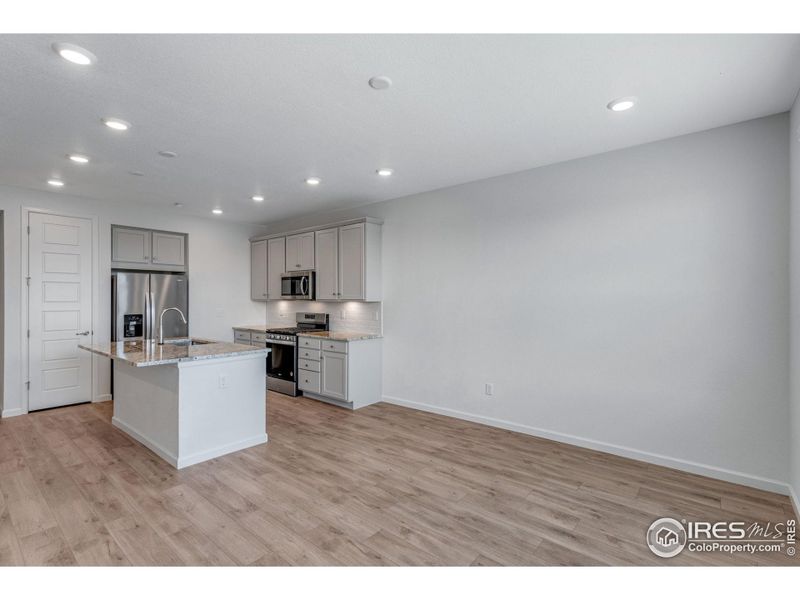 Spacious, unfurnished interior of a new home in Westside Crossing Townhomes, Berthoud (Image 30).
