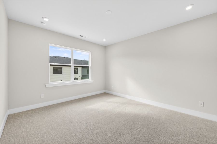 Spacious, unfurnished interior of a new home in Seven Oaks, Belmont (Image 43).