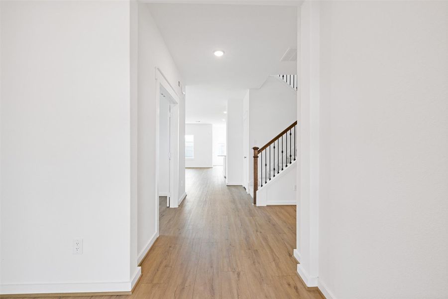 Spacious, unfurnished interior of a new home in Sunterra, Katy (Image 36).