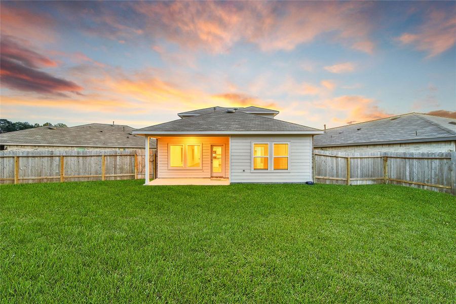 Exterior details and patio area of a home in Breckenridge Forest, Spring (Image 3).