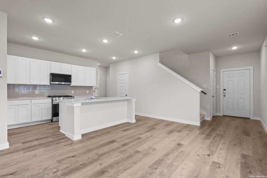Furnished interior view inside a new home in Mesa Vista, San Antonio (Image 10).