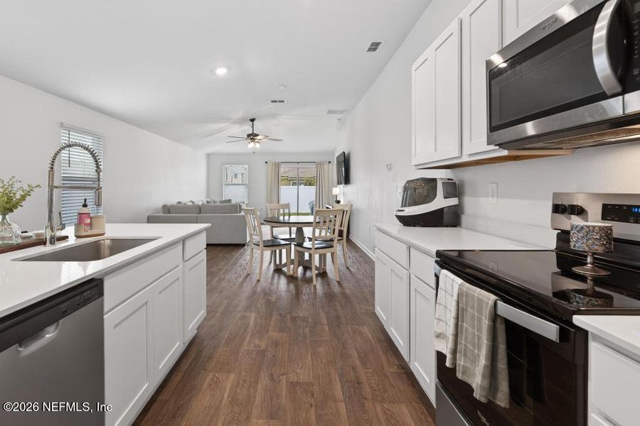 Furnished interior view inside a new home in Cross Creek Express, Green Cove Springs (Image 14).