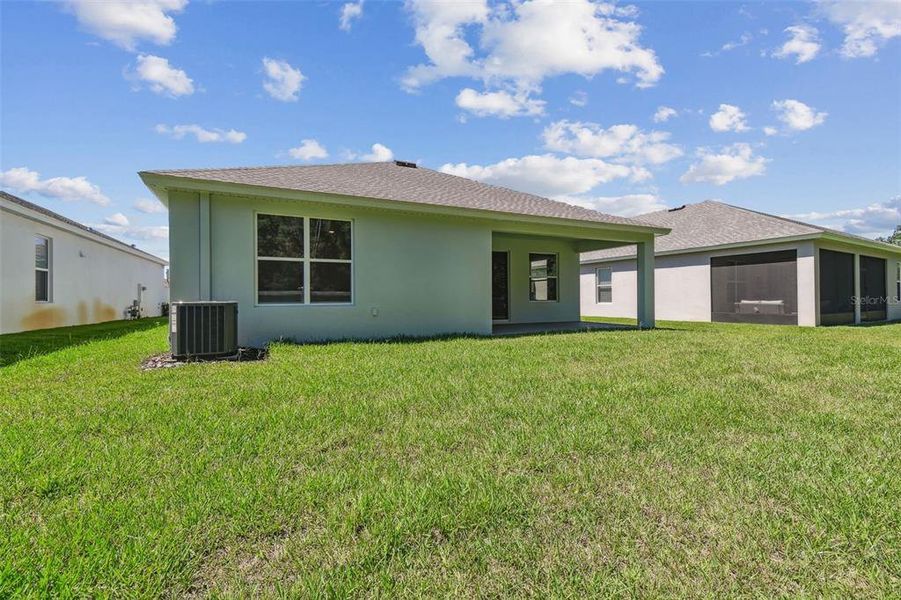 Front exterior of a new home in Cascades at Southern Hills, Brooksville, FL, highlighting curb appeal (Image 2).