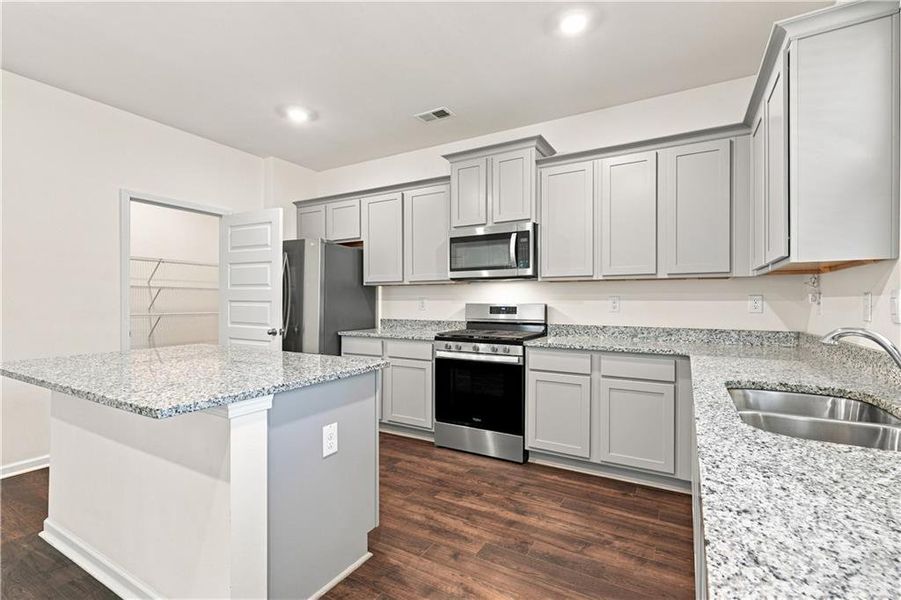 Furnished interior view inside a new home in The Enclave at Flat Rock Hills, Stonecrest (Image 10).