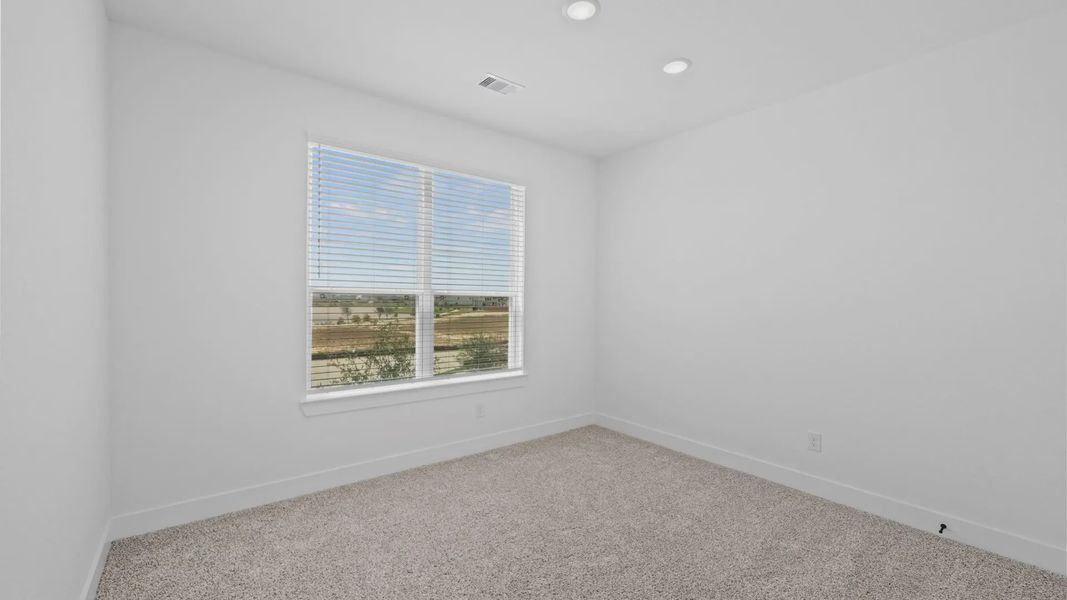 Representative unfurnished interior of a home built from the Rivers by Chesmar Homes in Sofi Lakes, Katy (Image 36).