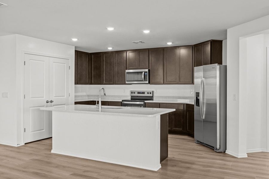 Furnished interior view inside a new home in Skyline Village Enclaves, San Tan Valley (Image 4).
