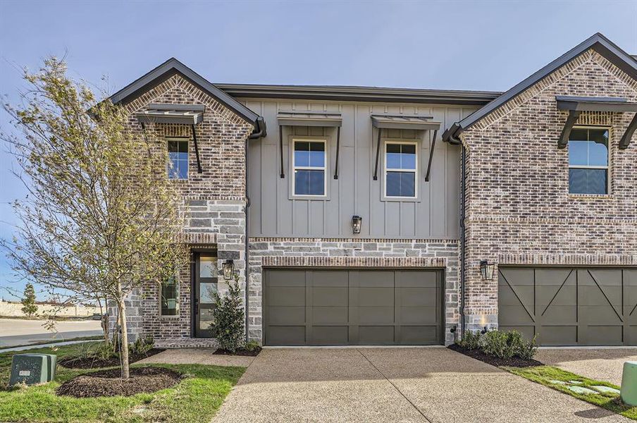 View of front of house with a garage