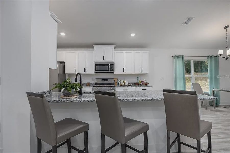 Furnished interior view inside a new home in Briarwood, Alachua (Image 8).