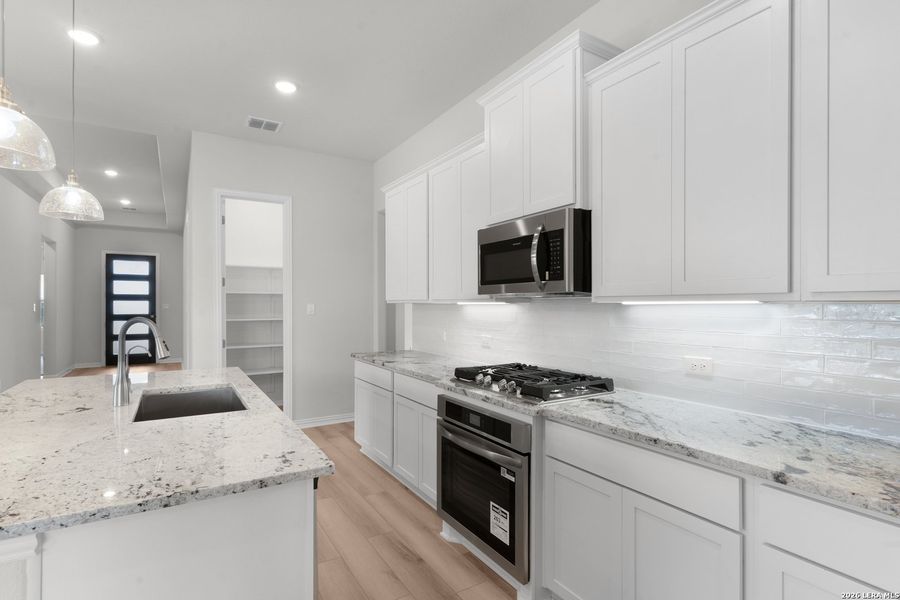 Furnished interior view inside a new home in The Crossvine, Schertz (Image 5).