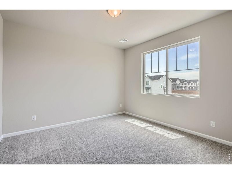 Spacious, unfurnished interior of a new home in Farmstead, Berthoud (Image 38).